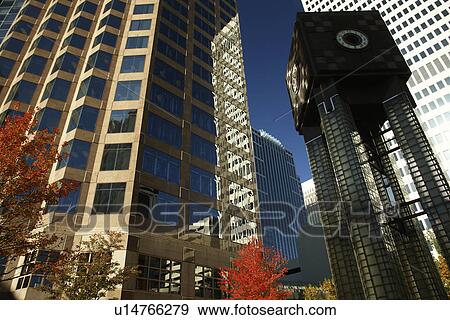Stock Photo -  Charlotte, NC, North Carolina, Downtown, high-rise buildings, clock, autumn. Fotosearch