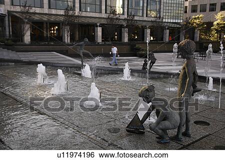 Stock Photograph -  Charlotte, NC, North Carolina, Downtown, plaza, fountain children playing. Fotosearch
