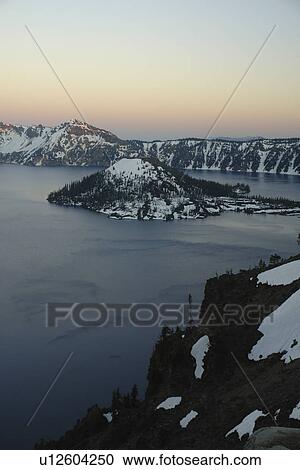 Crater Lake National Park, OR, Oregon, Cascade Range, Volcanic Legacy Scenic Byway from Rim Drive, Wizard Island, sunset View Large Photo Image Stock Image - Crater Lake National Park, OR, Oregon, Cascade Range, Volcanic Legacy Scenic Byway from Rim Drive, Wizard Island, sunset. Fotosearch