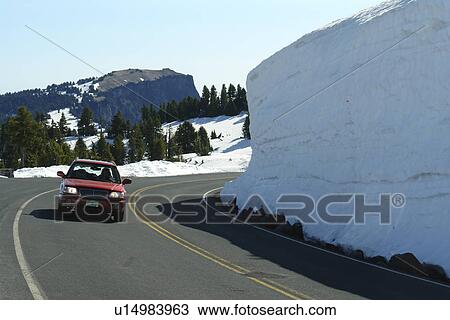 Crater Lake National Park, OR, Oregon, Cascade Range, Volcanic Legacy Scenic Byway, Rim Drive, side of road packed high with snow View Large Photo Image Stock Image - Crater Lake National Park, OR, Oregon, Cascade Range, Volcanic Legacy Scenic Byway, Rim Drive, side of road packed high with snow. Fotosearch