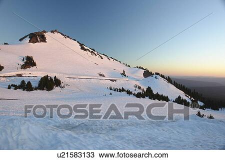 Crater Lake National Park, OR, Oregon, Cascade Range, Volcanic Legacy Scenic Byway from Rim Drive, snow, sunset View Large Photo Image Stock Image - Crater Lake National Park, OR, Oregon, Cascade Range, Volcanic Legacy Scenic Byway from Rim Drive, snow, sunset. Fotosearch