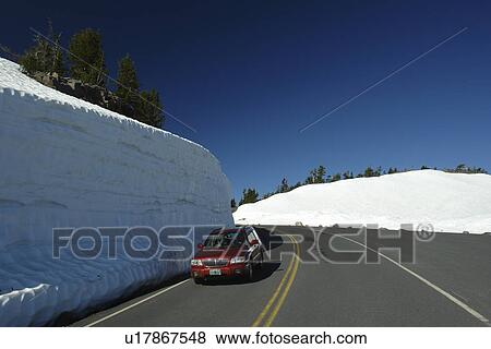 Crater Lake National Park, OR, Oregon, Cascade Range, Volcanic Legacy Scenic Byway, Rim Drive, side of road packed high with snow View Large Photo Image Stock Photo -  Crater Lake National Park, OR, Oregon, Cascade Range, Volcanic Legacy Scenic Byway, Rim Drive, side of road packed high with snow. Fotosearch