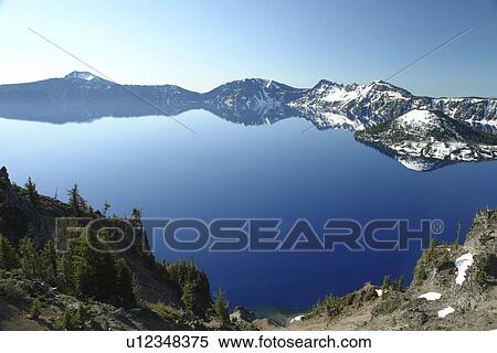 Crater Lake National Park, OR, Oregon, Cascade Range, Volcanic Legacy Scenic Byway from Rim Drive, Wizard Island View Large Photo Image Stock Photography - Crater Lake National Park, OR, Oregon, Cascade Range, Volcanic Legacy Scenic Byway from Rim Drive, Wizard Island. Fotosearch