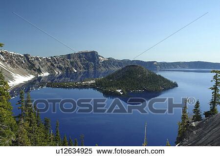 Stock Photography -  Crater Lake National Park, OR, Oregon, Cascade Range, Volcanic Legacy Scenic Byway, Rim Drive, Wizard Island. Fotosearch
