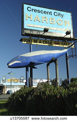 Stock Photo -  Crescent City, CA, California, Pacific Ocean, Ocean World, whale statue, Crescent City Harbor sign. Fotosearch