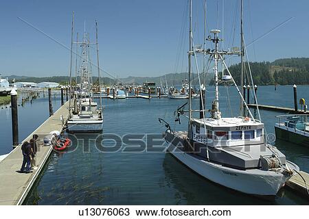 Stock Image -  Florence, OR, Oregon, Pacific Ocean, Pacific Coast Scenic Byway, Rt Route, Highway 101, Old Town Florence, harbor, waterfront. Fotosearch