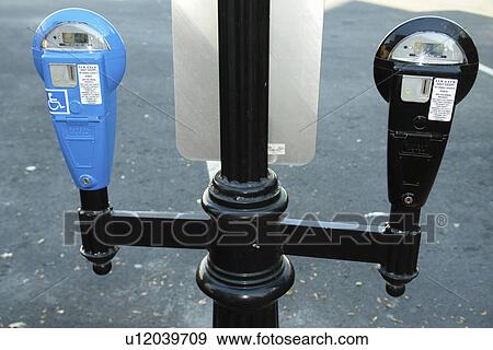 Stock Photo -  Gettysburg, PA, Pennsylvania, downtown, parking meters, Reserved Parking for Handicapped. Fotosearch