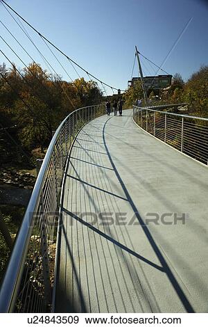 Stock Photo -  Greenville, SC, South Carolina, Reedy River Falls Historic Park, autumn, foot bridge. Fotosearch