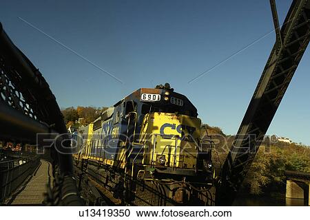 Stock Image -  Harpers Ferry, WV, West Virginia, railroad bridge, freight train. Fotosearch