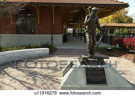 Stock Photo -  High Point, NC, North Carolina, The Plank Road Foreman Statue, train station. Fotosearch