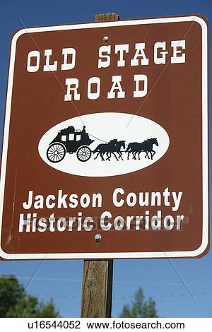 Stock Image -  Historic Jacksonville, OR, Oregon, Gold Mining Town, Jackson County Historic Corridor, Old Stage Road, road sign. Fotosearch