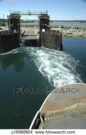 Picture -  Keystone, WA, Washington, Puget Sound, Whidbey Island, Port Townsend, San Juan Islands, Admiralty Inlet and Head, car and passenger ferry, landing. Fotosearch
