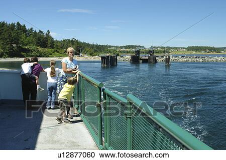 Stock Image -  Keystone, WA, Washington, Puget Sound, Whidbey Island, Port Townsend, San Juan Islands, Admiralty Inlet and Head, car and passenger ferry. Fotosearch