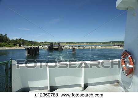 Stock Photo -  Keystone, WA, Washington, Puget Sound, Whidbey Island, Port Townsend, San Juan Islands, Admiralty Inlet and Head, car and passenger ferry. Fotosearch