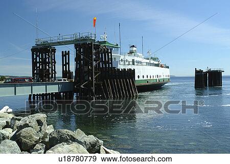 Stock Photo -  Keystone, WA, Washington, Puget Sound, Whidbey Island, Port Townsend, San Juan Islands, Admiralty Inlet and Head, car and passenger ferry, landing. Fotosearch