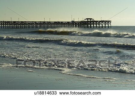 Stock Image -  Myrtle Beach, SC, South Carolina, The Grand Strand, fishing pier, beach. Fotosearch