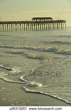 Stock Image -  Myrtle Beach, SC, South Carolina, The Grand Strand, fishing pier, beach. Fotosearch