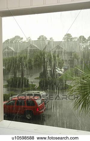 Stock Photo -  Myrtle Beach, SC, South Carolina, The Grand Strand, Plantation Resort, rain shower, parking lot. Fotosearch