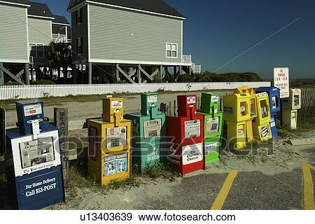 Stock Photo -  Myrtle Beach, SC, South Carolina, The Grand Strand, colorful newspaper dispenser boxes. Fotosearch