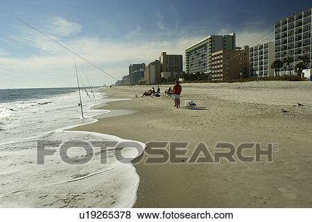Stock Photo -  Myrtle Beach, SC, South Carolina, The Grand Strand, people fishing. Fotosearch