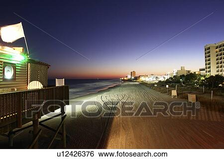 Stock Photograph -  Myrtle Beach, SC, South Carolina, The Grand Strand, resorts, evening. Fotosearch