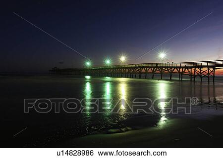 Stock Photograph -  Myrtle Beach, SC, South Carolina, The Grand Strand, pier, evening. Fotosearch