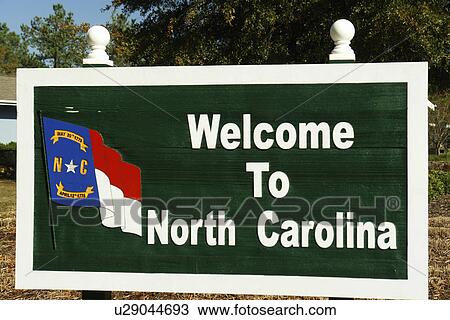 Stock Image -  NC, North Carolina, Welcome to North Carolina, road sign, stateline, border. Fotosearch
