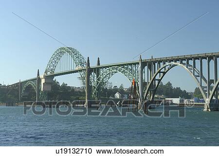 Stock Image -  Newport, OR, Oregon, Pacific Ocean, Pacific Coast Scenic Byway, Rt Route, Highway 101, Yaquina Bay River, Yaquina Bay Bridge. Fotosearch