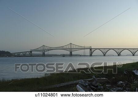 Stock Image -  North Bend, OR, Oregon, Pacific Ocean, Pacific Coast Scenic Byway, Rt Route, Highway 101, Conde B. McCullough Memorial Bridge, Coos Bay, cantilever bridge. Fotosearch