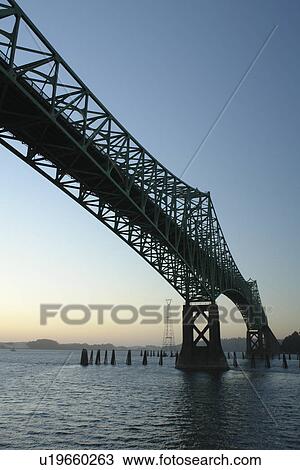 Stock Image -  North Bend, OR, Oregon, Pacific Ocean, Pacific Coast Scenic Byway, Rt Route, Highway 101, Conde B. McCullough Memorial Bridge, Coos Bay, cantilever bridge. Fotosearch