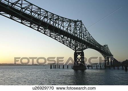 Stock Image -  North Bend, OR, Oregon, Pacific Ocean, Pacific Coast Scenic Byway, Rt Route, Highway 101, Conde B. McCullough Memorial Bridge, Coos Bay, cantilever bridge. Fotosearch