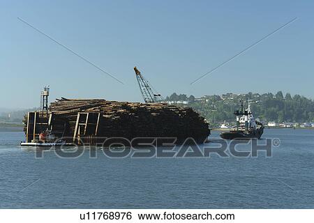 North Bend, OR, Oregon, Pacific Ocean, Pacific Coast Scenic Byway, Rt Route, Highway 101, Coos Bay from Casino, barge carrying lumber View Large Photo Image Stock Photograph - North Bend, OR, Oregon, Pacific Ocean, Pacific Coast Scenic Byway, Rt Route, Highway 101, Coos Bay from Casino, barge carrying lumber. Fotosearch