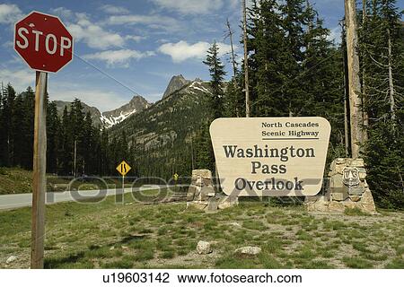 Stock Image -  North Cascades Scenic Highway, WA, Washington, Okanogan National Forest, Cascade Range, SR 20, Washington Pass Overlook, entrance sign. Fotosearch