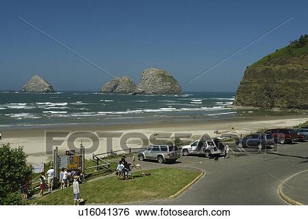 Stock Photograph -  Oceanside, OR, Oregon, Pacific Ocean, Pacific Coast Scenic Byway, Rt Route, Highway 101, Three Arched Rocks. Fotosearch