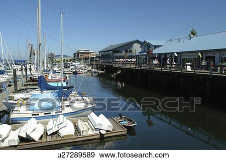 Stock Photo -  Olympia, WA, Washington, Puget Sound, Percival Landing Park, Budd Inlet, City Waterfront, marina. Fotosearch