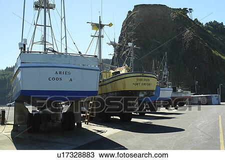 Stock Image -  Port Orford, OR, Oregon, Pacific Ocean, Pacific Coast Scenic Byway, Rt Route, Highway 101, fishing boats, dry dock. Fotosearch