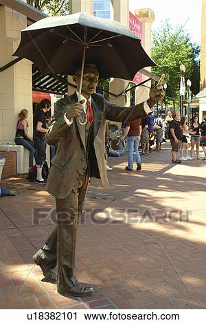 Portland, OR, Oregon, downtown, Pioneer Courthouse Square, Allow Me statue, bronze statue of man with umbrella View Large Photo Image Stock Image - Portland, OR, Oregon, downtown, Pioneer Courthouse Square, Allow Me statue, bronze statue of man with umbrella. Fotosearch