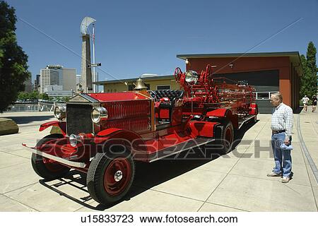 Stock Image -  Portland, OR, Oregon, Fire Station, antique red fire truck. Fotosearch
