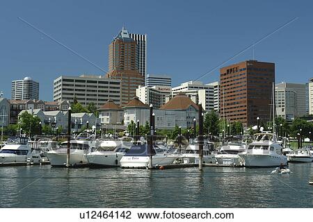 Stock Image -  Portland, OR, Oregon, Willamette River, downtown, skyline, Riverplace Marina. Fotosearch