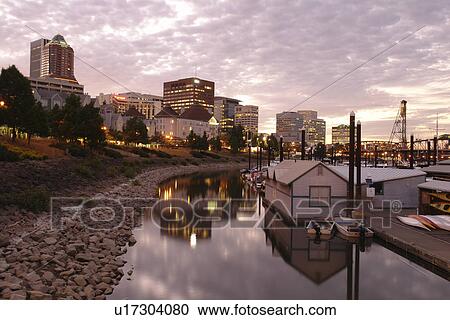Stock Image -  Portland, OR, Oregon, Willamette River, downtown, skyline, Riverplace Marina, sunset. Fotosearch