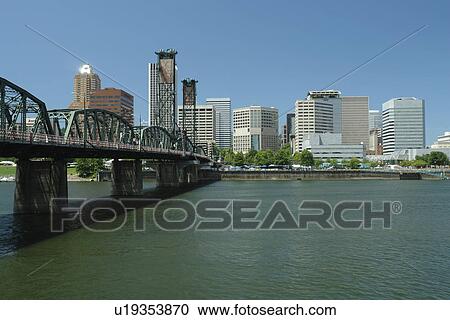 Stock Image -  Portland, OR, Oregon, Willamette River, Hawthorne Lift Bridge, downtown, skyline. Fotosearch