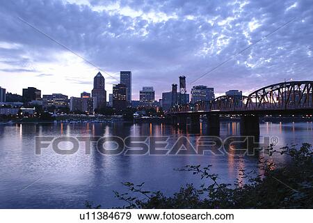 Stock Photo -  Portland, OR, Oregon, Willamette River, Hawthorne Lift Bridge, downtown, skyline, sunset. Fotosearch
