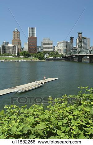 Stock Photograph -  Portland, OR, Oregon, Willamette River, Hawthorne Lift Bridge, downtown, skyline. Fotosearch