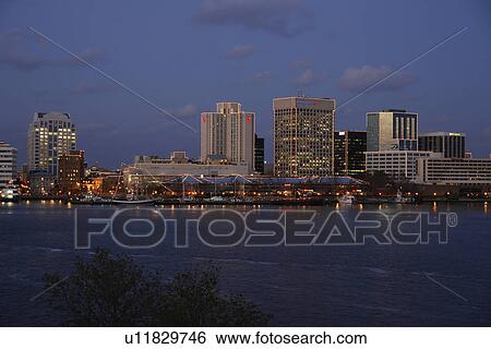 Stock Photograph -  Portsmouth, Norfolk, VA, Virginia, Hampton Roads Area, skyline, evening. Fotosearch