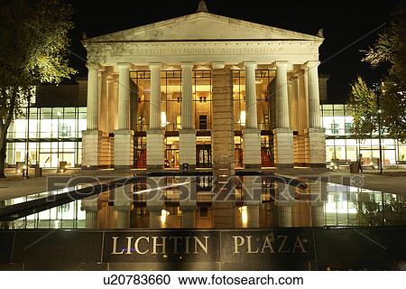 Stock Image -  Raleigh, NC, North Carolina, Raleigh Memorial Auditorium, Lichtin Plaza, evening. Fotosearch