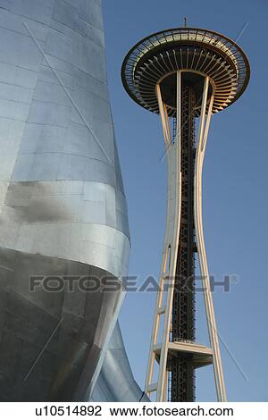 Stock Image -  Seattle, WA, Washington, Seattle Center, Space Needle, Experiment Music Project, Frank O. Gehry designed building. Fotosearch