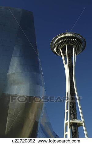 Stock Image -  Seattle, WA, Washington, Seattle Center, Space Needle, Experiment Music Project, Frank O. Gehry designed building. Fotosearch