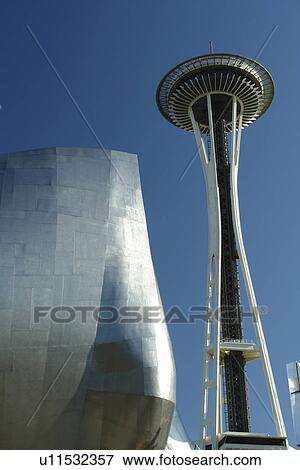Stock Photo -  Seattle, WA, Washington, Seattle Center, Space Needle, Experiment Music Project, Frank O. Gehry designed building. Fotosearch