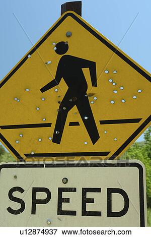 Silver City, ID, Idaho, Ghost Town, pedestrian crossing sign full of bullet holes View Large Photo Image Stock Photo - Silver City, ID, Idaho, Ghost Town, pedestrian crossing sign full of bullet holes. Fotosearch