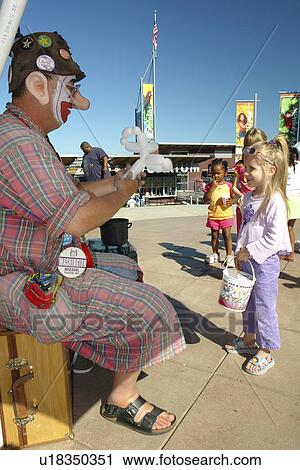 Tacoma, WA, Washington, Point Defiance Park, Point Defiance Zoo and Aquarium, clown entertaining children, making things from balloons View Large Photo Image Stock Image - Tacoma, WA, Washington, Point Defiance Park, Point Defiance Zoo and Aquarium, clown entertaining children, making things from balloons. Fotosearch